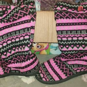 Pink and black slipper shoes